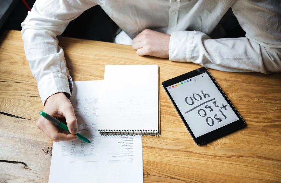 Trademark logo planning with notebook and smartphone