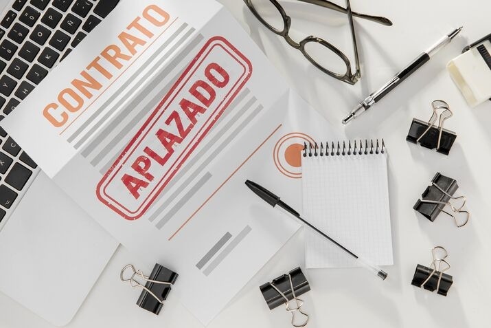 Cancelled trademark contract and legal documents on desk