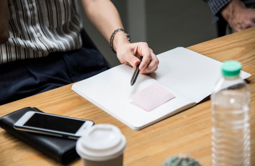 Small business owner completing trademark paperwork
